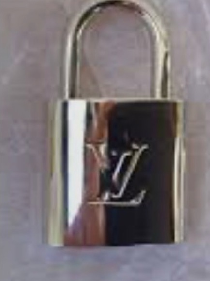 Louis Vuitton Silver-Tone Padlock With Lv Logo